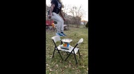 Guy does and incredible mind-boggling mid air water tap