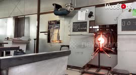 'Soothing Footage of a Glassmith Working on a Mug Handle  '