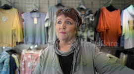 Owner of a women's clothes shop was forced to replace new floral signs after one person moaned they were too colourful