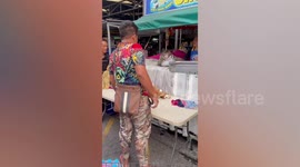 Obese monkey chained to a market stall being ‘killed with kindness’ as locals feed him junk food