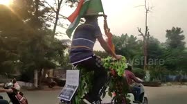 Local drives unique bicycle on the streets of eastern India