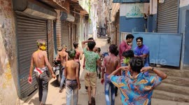 In Indian children's played Holi by Bycile music through walk