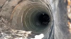 Pet cat rescued from 65ft-deep well after being stuck overnight