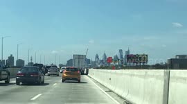 driving on the Philadelphia turnpike on a sunny day