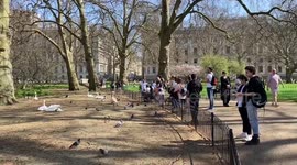 People enjoy London's St James’s Park on the hottest day of the year