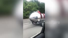 Modified car resembling space shuttle drives along highway in Ohio