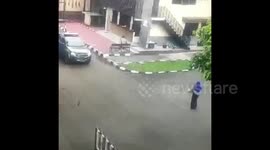 Armed woman shot by Indonesia authorities outside police headquarters