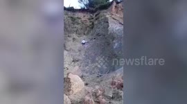Kind couple rescue dog stuck on steep mountain slope after being trapped for two days
