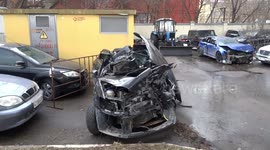 Black Volkswagen and blue Audi involved in major road accident with blogger Edward Bil kept outside Internal Affairs Department of Moscow Central District