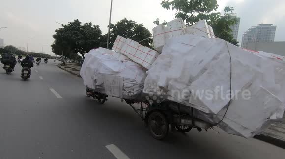 Ridiculously overloaded motorbike spotted on Vietnamese road
