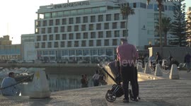 Portugal easing lockdown sees public return to scenic southern coast