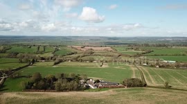 Drone footage show police at the home of murdered tycoon Sir Richard Sutton