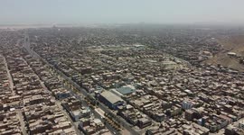 Aerial view of the district of San Martin de Porres and the Rimac river located north of the capital of Lima, Peru