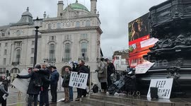 Julian Assange protest Picadilly Circus