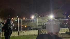 Protestors in Brooklyn Center, Minnesota begin bombarding the police with projectiles.