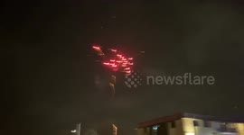 Fireworks and concussion grenades. Explosions fill the air in Brooklyn Center, Minnesota as police and protestors clash