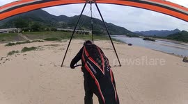 Hang glider suffers heavy fall as he face-plants beach in South Korea