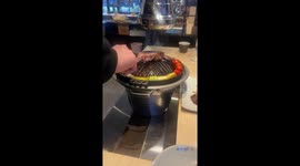 Lamb chop BBQ (barbeque) on Chingis khan Grill with vegetables