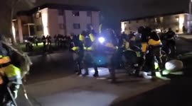 Man claiming to be press held to ground by US police on fourth night of Daunte Wright protest