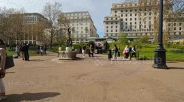 People in London enjoying the sun in Green park after lockdown restrictions lifted