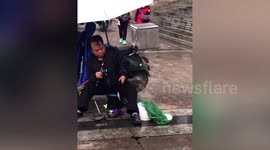 Chinese citizens manage to catch fish from drains on river embankment