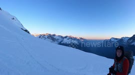 A pair of hikers were followed to the summit of a mountain by a CAT!