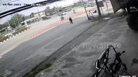 Truck wheel comes loose before smashing into parked car
