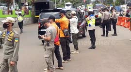 Checking drivers for rapid antigen test results in West Java, Indonesia