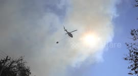 Scenes of helicopters being used to fight the Cape Town mountain fires