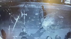 Daft crook caught on CCTV repeatedly FAILS to smash a shop window