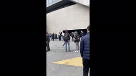 FUNNY UNCLE EATING CHICKEN AND CHIPS WHILST WATCHING A PROTEST