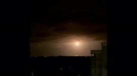 Americans react as SpaceX shuttle carrying four astronauts flies across sky