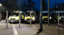 Riot vans are positioned to block road at Kroenke Out protest at Emirates Stadium