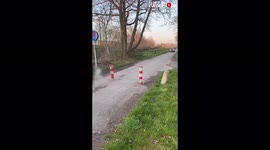 'Car Doesn't Break Down after Running Over Traffic Pole... Made of Rubber'