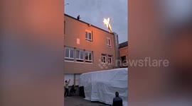 French stuntman leaps from a rooftop while he was set ON FIRE