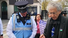 Piers Corbyn delivers letter addressed to Cressida D at Scotland Yard