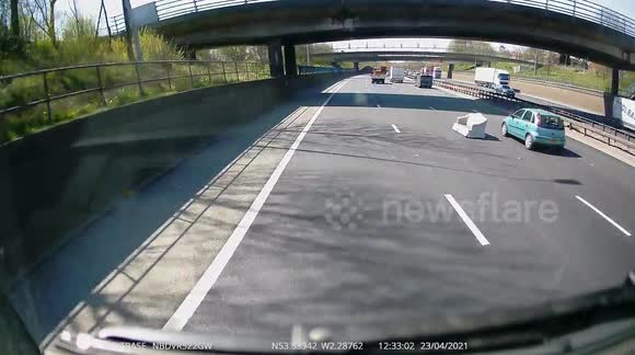 Have a seat: Sofa dropped on Manchester motorway leaves UK drivers baffled