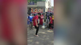 Myanmar football freestyler juggles ball during military coup protest