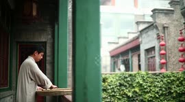 Zhang Yu Basks the Soil Collected to Break it into Dry Pellets