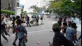 Intense scene as police and protesters in Colombia clash amid controversial tax reform