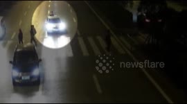 Roller skater secretly tows behind moving car