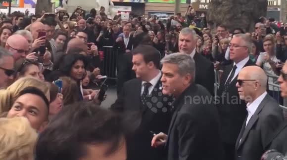 George Clooney greets fans in London