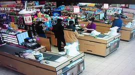 Man Knocks Out Old Man While Checking Out At Cash Register