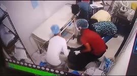 Watch - Shameful act - Hospital staffs caught on Cam stealing money from pocket of dead covid patient