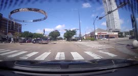 Car runs red light and crashes into and flips truck in Houston