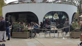 Buskers Play Live Music While Liz Hurley Ex Husband Arun Nayar Walking in Duke of York Square