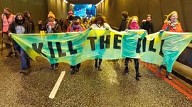 Killthebill protesters cause a huge traffic Jam they march down the A40 alongside their bus