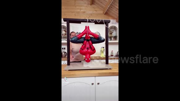 UK baker's hanging Spider-Man cake catches millions of viewers in its web
