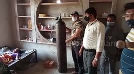 Police official arranges oxygen cylinder to help man's ailing mother in central India