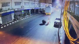 Lucky escape: Motorcyclist dodges huge loose wheel after it flies off truck